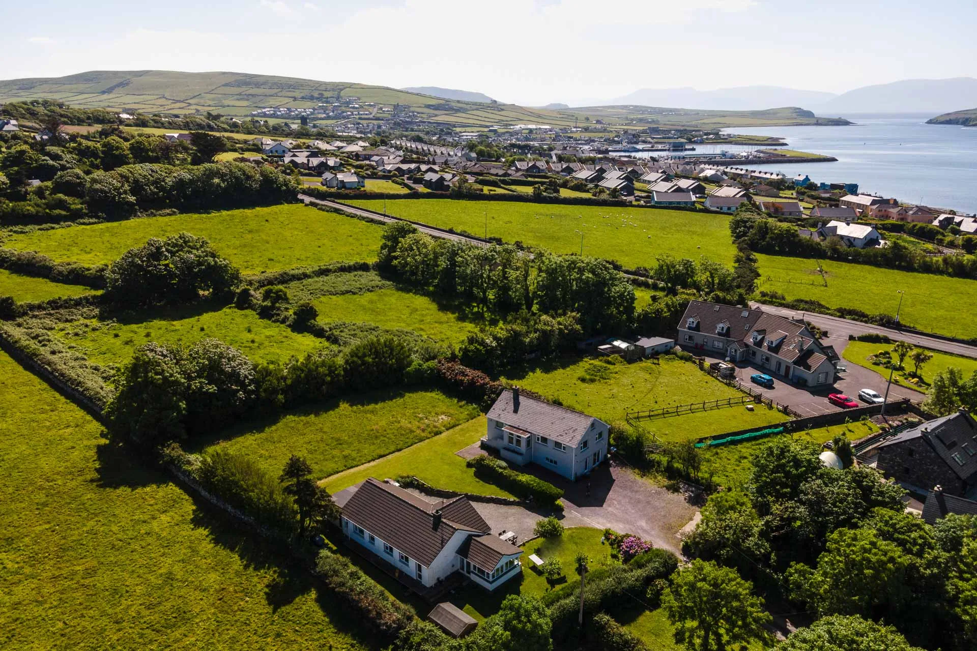 Aerial view across Milltown Cottage toward Dingle town and harbour